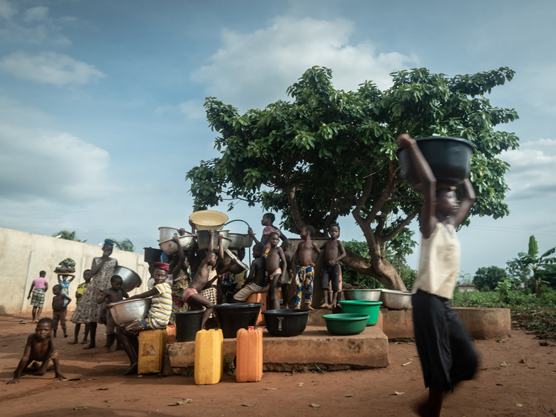Village water point in Benin serving households daily.